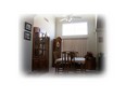 Formal dining room right off the kitchen for convenience...